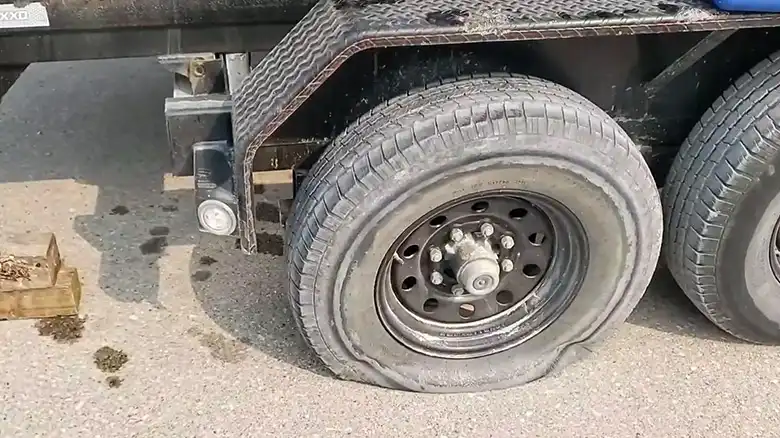 can you drive a trailer with a blown tire